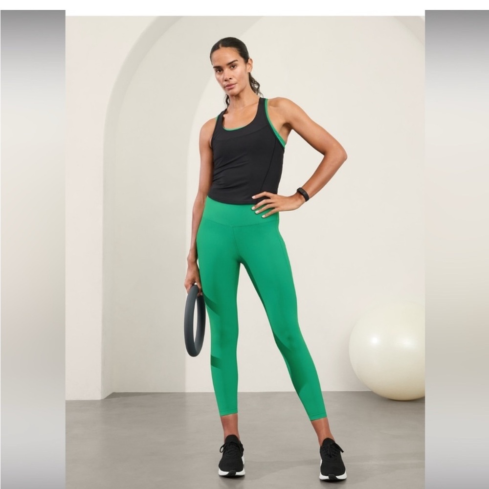 ATHLETA INTERVAL STASH HIGH RISE 7/8 LEGGING SIZE SMALL GREEN